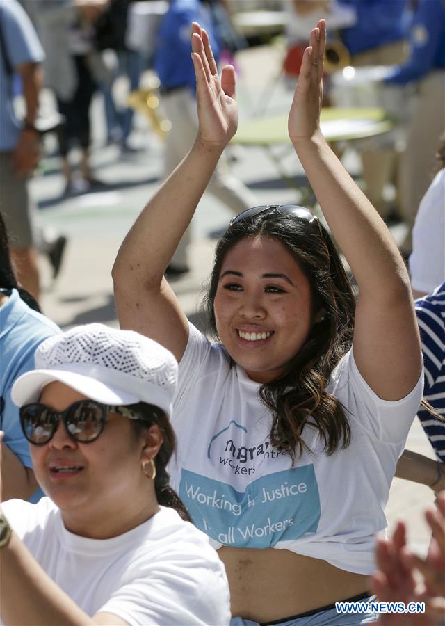 CANADA-VANCOUVER-MIGRANT WORKERS-FLASH MOB