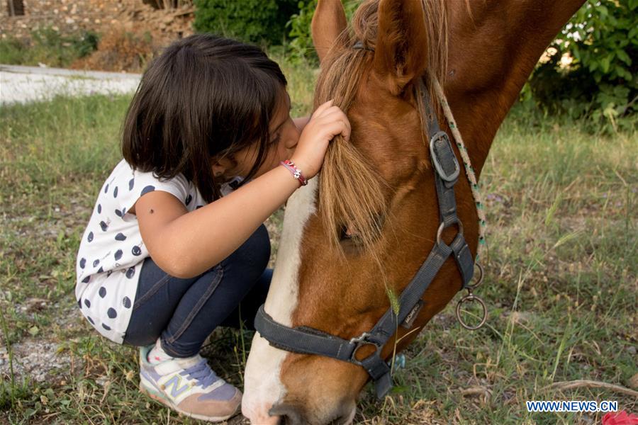 GREECE-LARISSA-HORSE THERAPY-CHILDREN