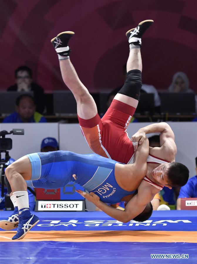 (SP)INDONESIA-JAKARTA-ASIAN GAMES-WRESTLING-MEN'S FREESTYLE 57 KG