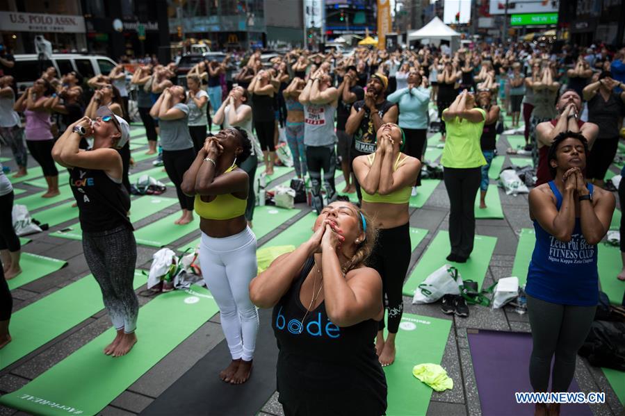 U.S.-NEW YORK-TIMES SQUARE-YOGA