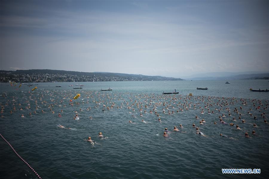 SWITZERLAND-ZURICH-LAKE CROSSING-SWIMMING