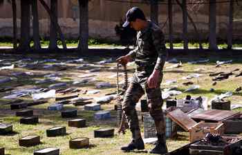 Confiscated weapons seen in military base in countryside of Damascus, Syria