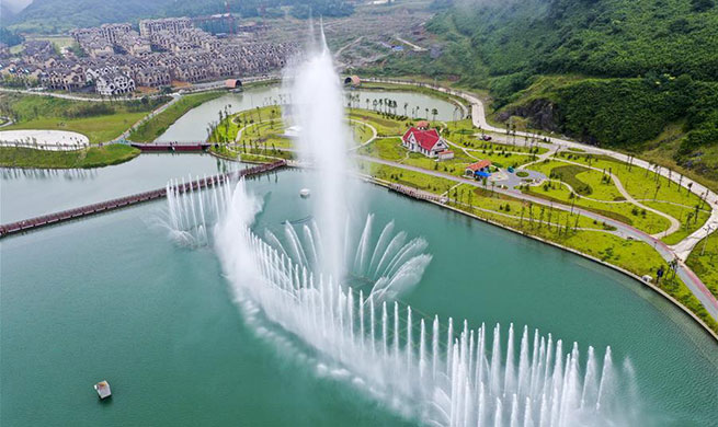 People have fun at Nantian Lake scenic area in Chongqing