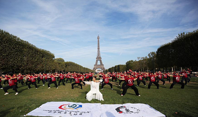 People practice Qigong in Paris, France