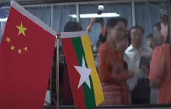 Aung San Suu Kyi visits Myanmar children at Beijing hospital