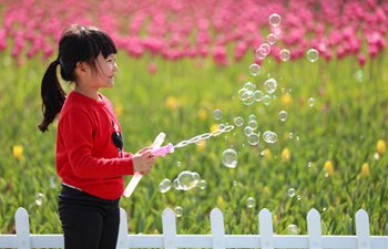 Children enjoy playing outdoors as spring arrives